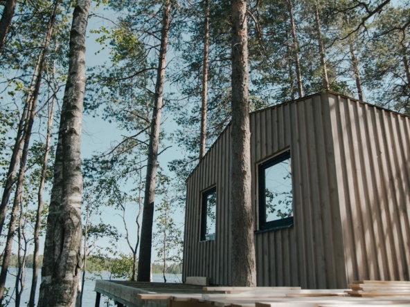 off-grid prefab home in the woods